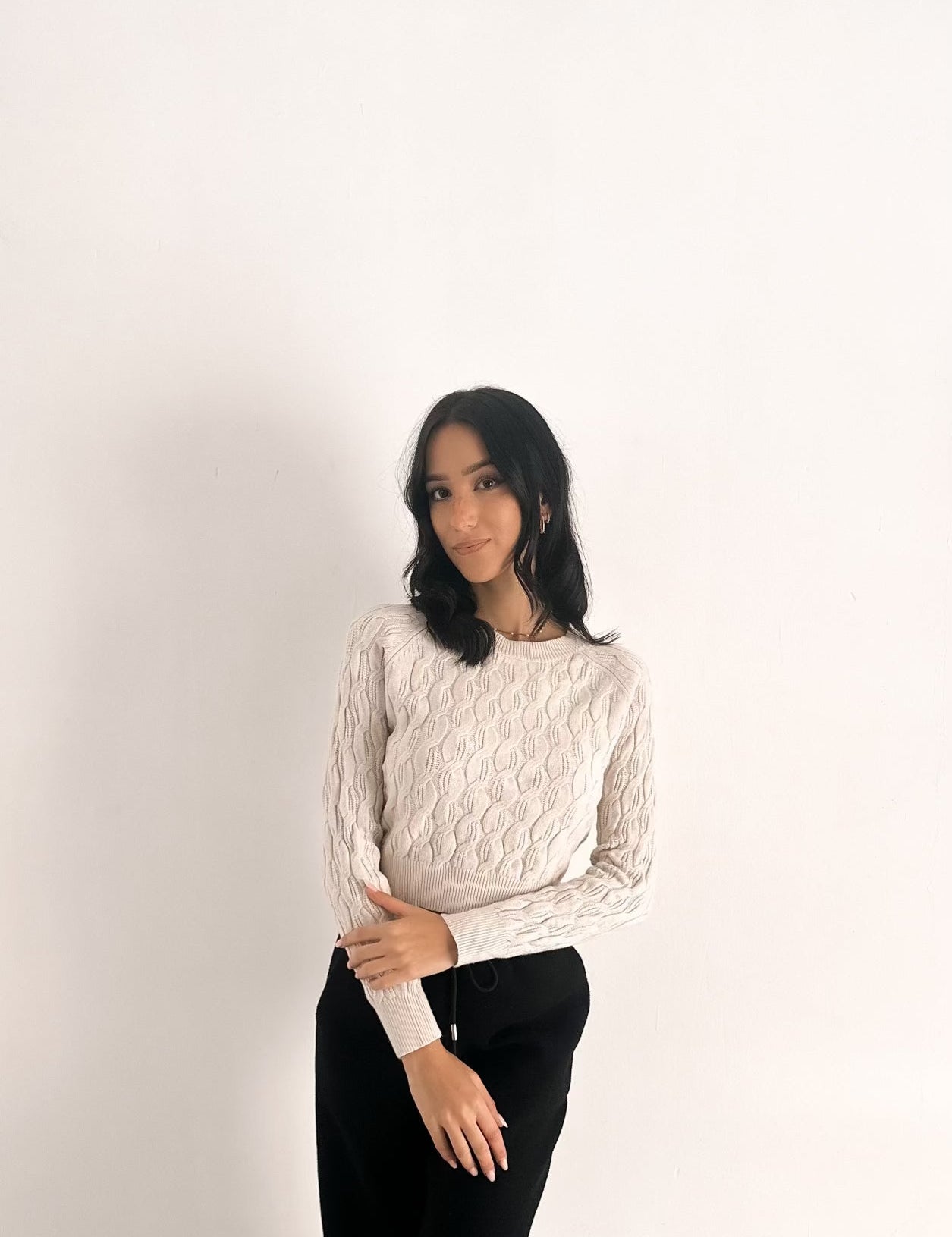Maglione con trecce