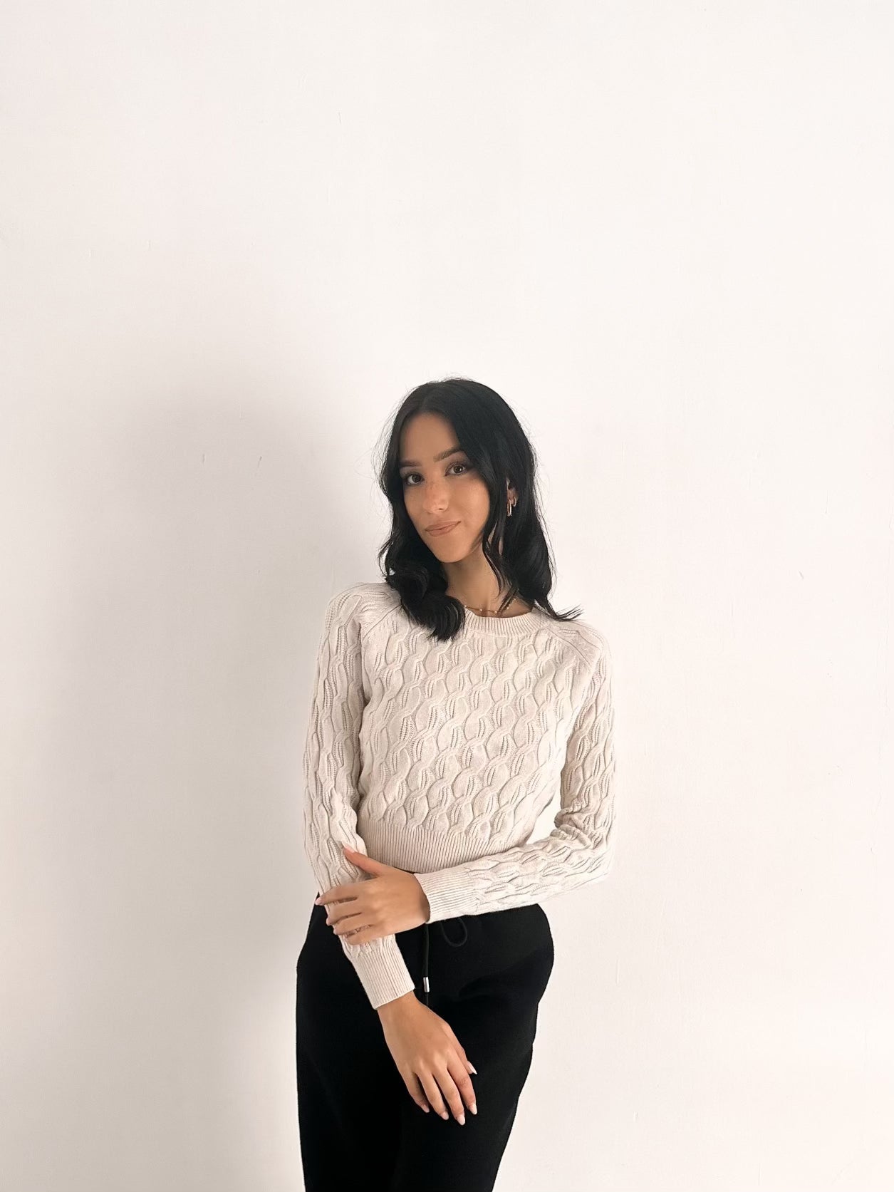 Maglione con trecce