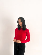 Maglione con trecce