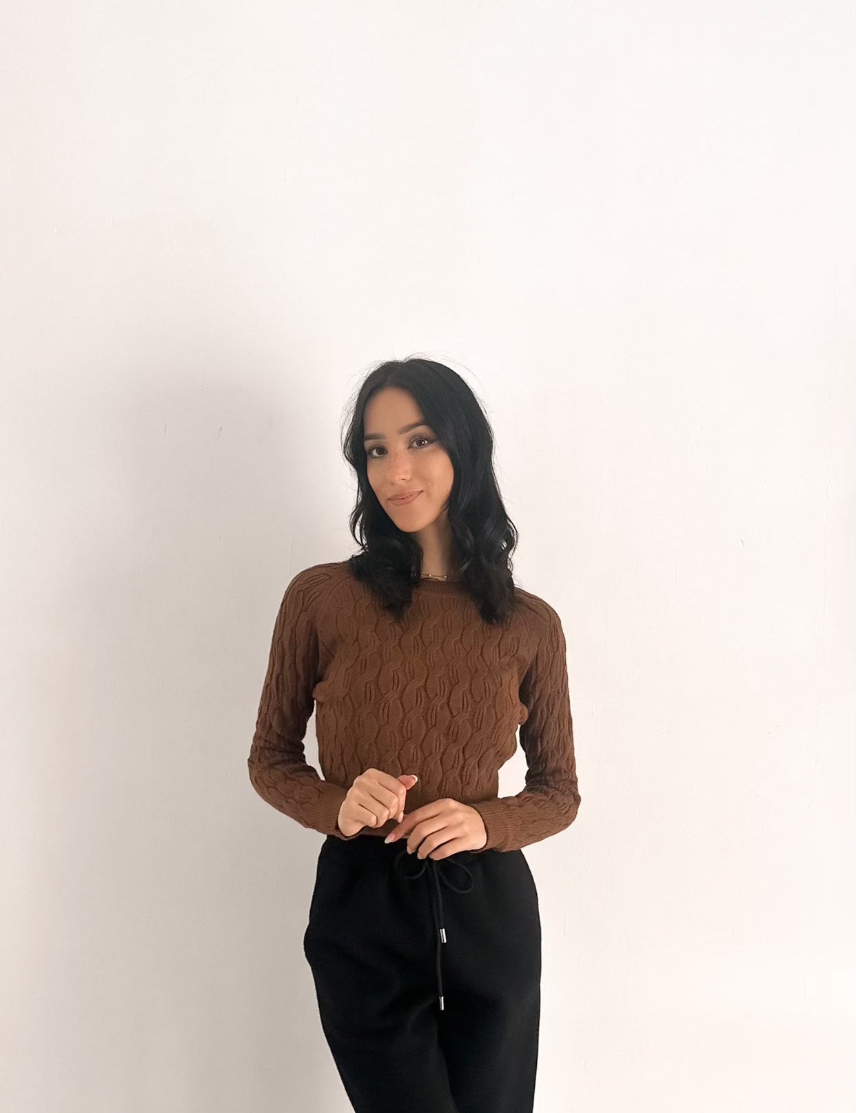 Maglione con trecce