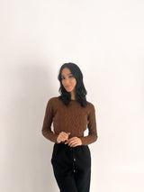 Maglione con trecce